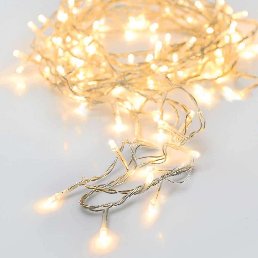 Grinalda a pilhas multifunções 24 leds branco quente cabo transparente IP44 2,30m